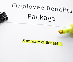 Employee Benefits Package with Yellow Highlighter on Top