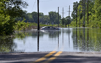 Car in flooded road