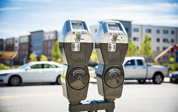 Close-Up of Parking Meter Showing Credit Card Slot and Coin Slot