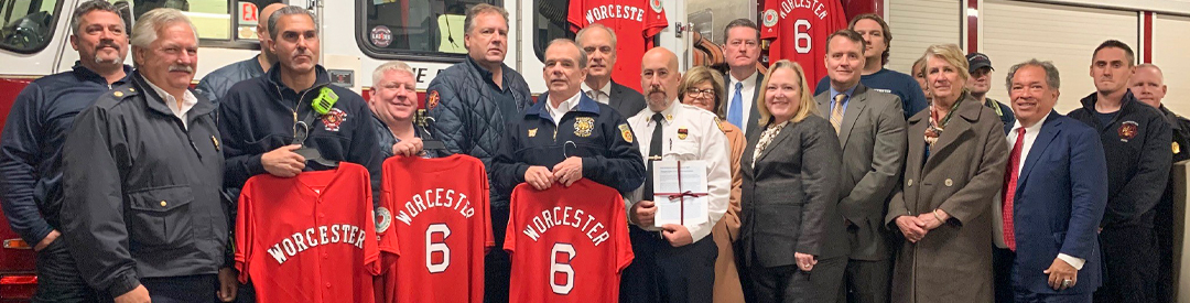 Members of the WFD, Red Sox and Dignitaries Holding Red Sox W6 Jerseys