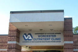 Worcester VA Clinic Logo, Front of Worcester VA Clinic Building with Sign