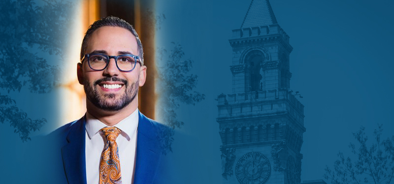 City Manager's Headshot Overlaid on City Hall Exterior and Clock Tower