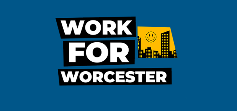Work for Worcester Logo with Black and White Text on Blue Background and Yellow Graphic of Buildings and Smiley Face