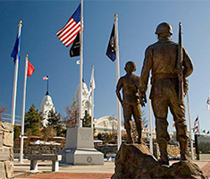 Statues with Flags in Background from Korean War Memorial