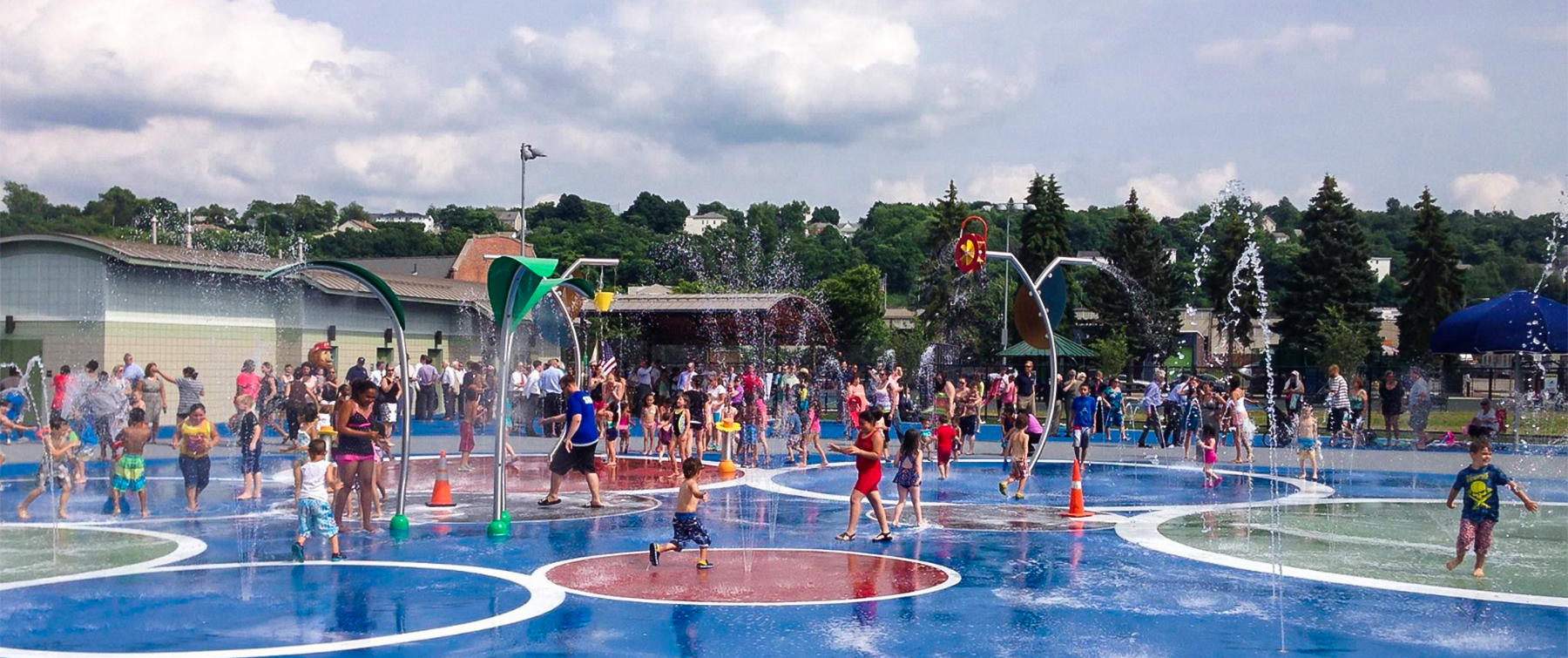 Group of Children Playing at Splash Pad