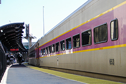 Passenger Platform at the Commuter Rail at Union Station with a Commuter Train Loading Passengers