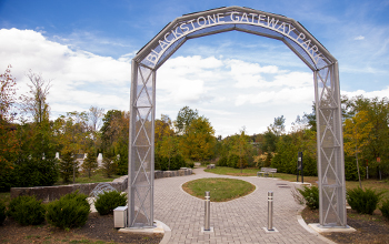 Entryway Metal Arch to Park from McKeon Road