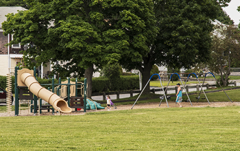Kids Playing on Play Structure at Harrington Field