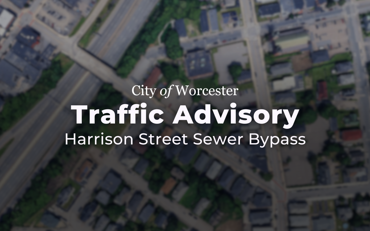Aerial photo of streets with text overlayed that reads, "Traffic Advisory: Harrison Street Sewer Bypass"