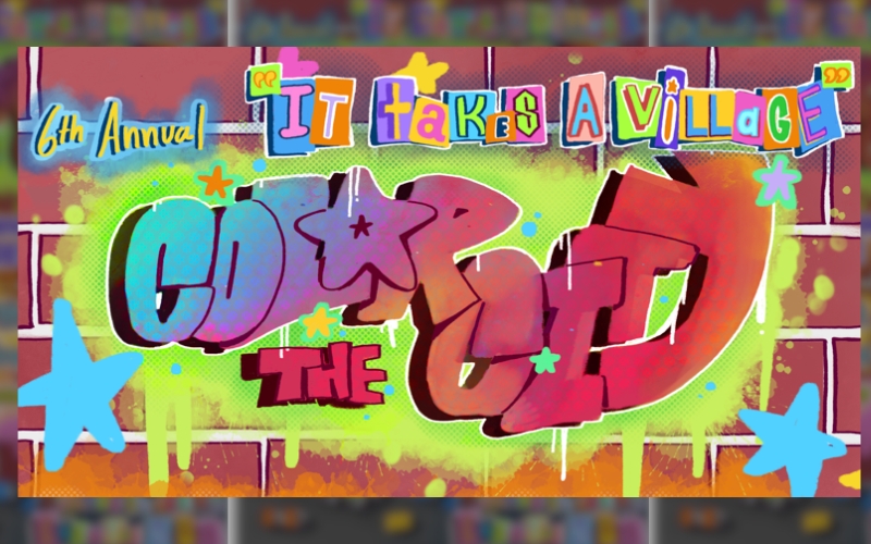 The words "Sixth annual Color The City" and "It Takes a Village" appear spray painted on a brick wall 
