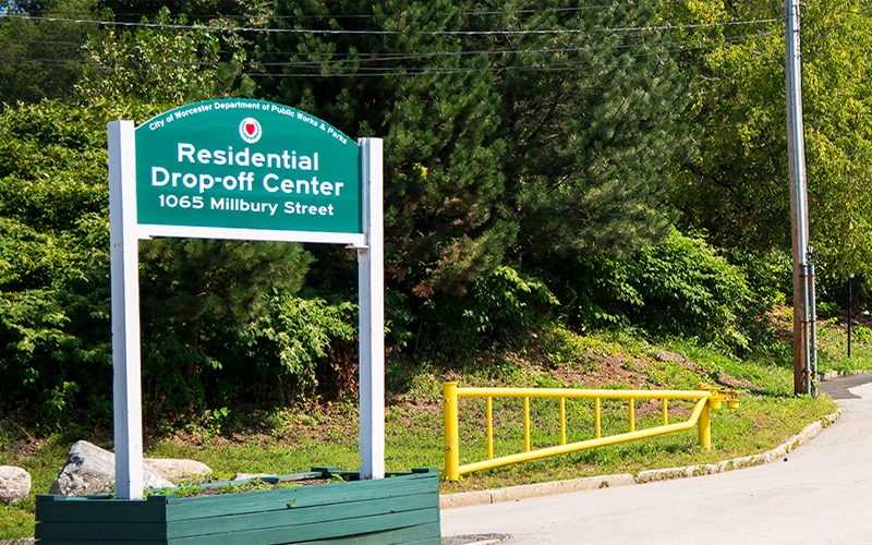 Green and White Sign at Entrance of Residential Drop-Off Center on Millbury Street
