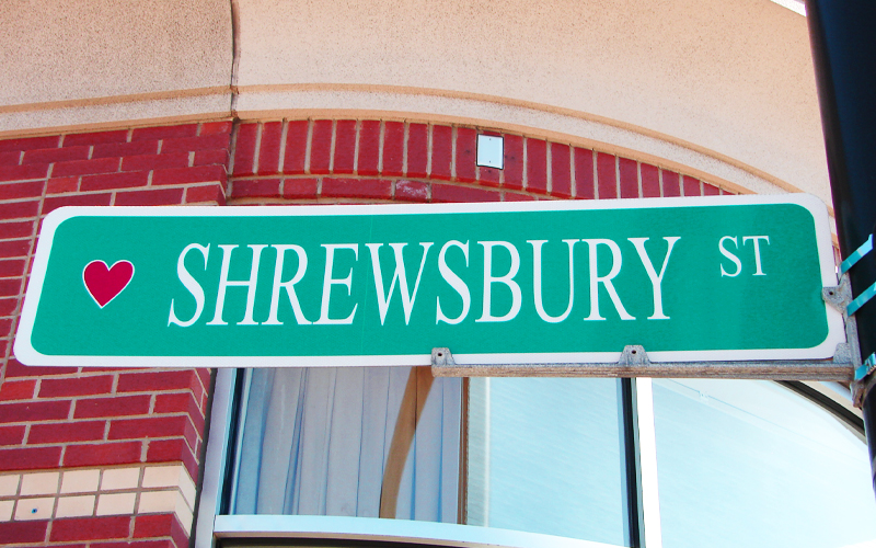 Shrewsbury Street Road Sign in Front of Brick Wall