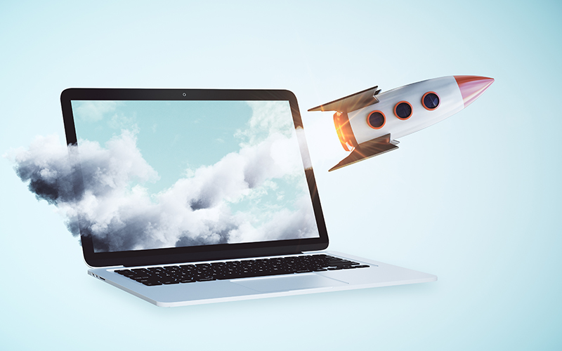 Laptop with Illustration of Rocket Launching from the Screen