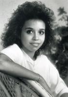 Headshot Photo of Nereida Melendez Sitting in a Chair