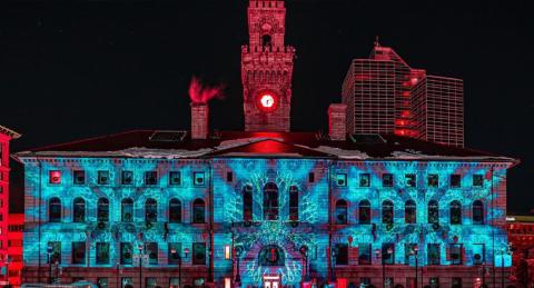 City Hall Facade at Night with Blue and Red Projected Snowflake Images