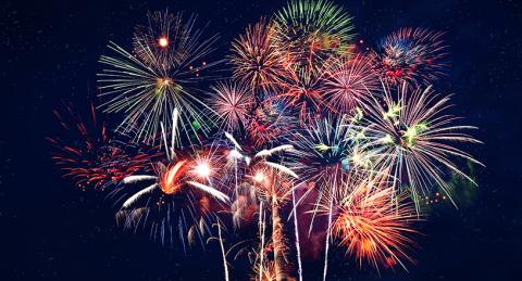 Colorful Fireworks Exploding in Black Sky