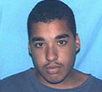 Headshot of Travis Monroe