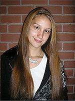 Headshot of Sabrina Hatheway Wearing Black Coat